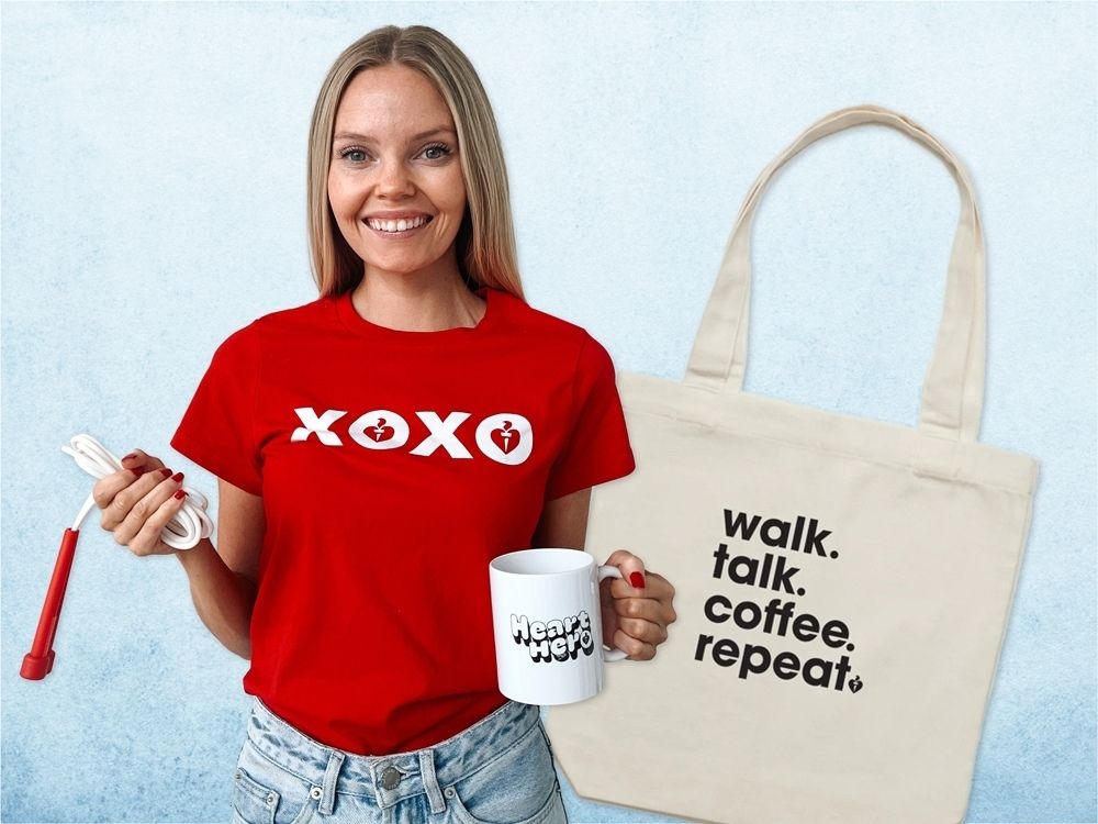 A young woman wearing the XOXO t-shirt, holding a skipping rope and mug