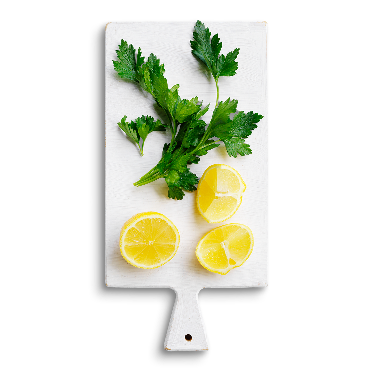 Charred lemon halves and chopped parsley