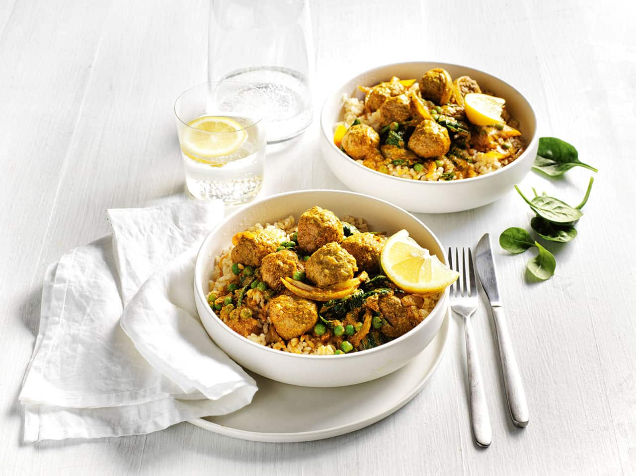 Two bowls of delicious Tikka meatball curry