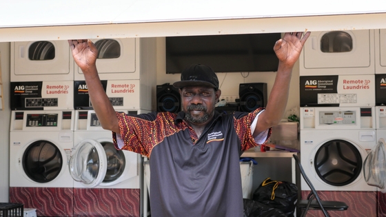 An Aboriginal man standing in a Remote Laundry