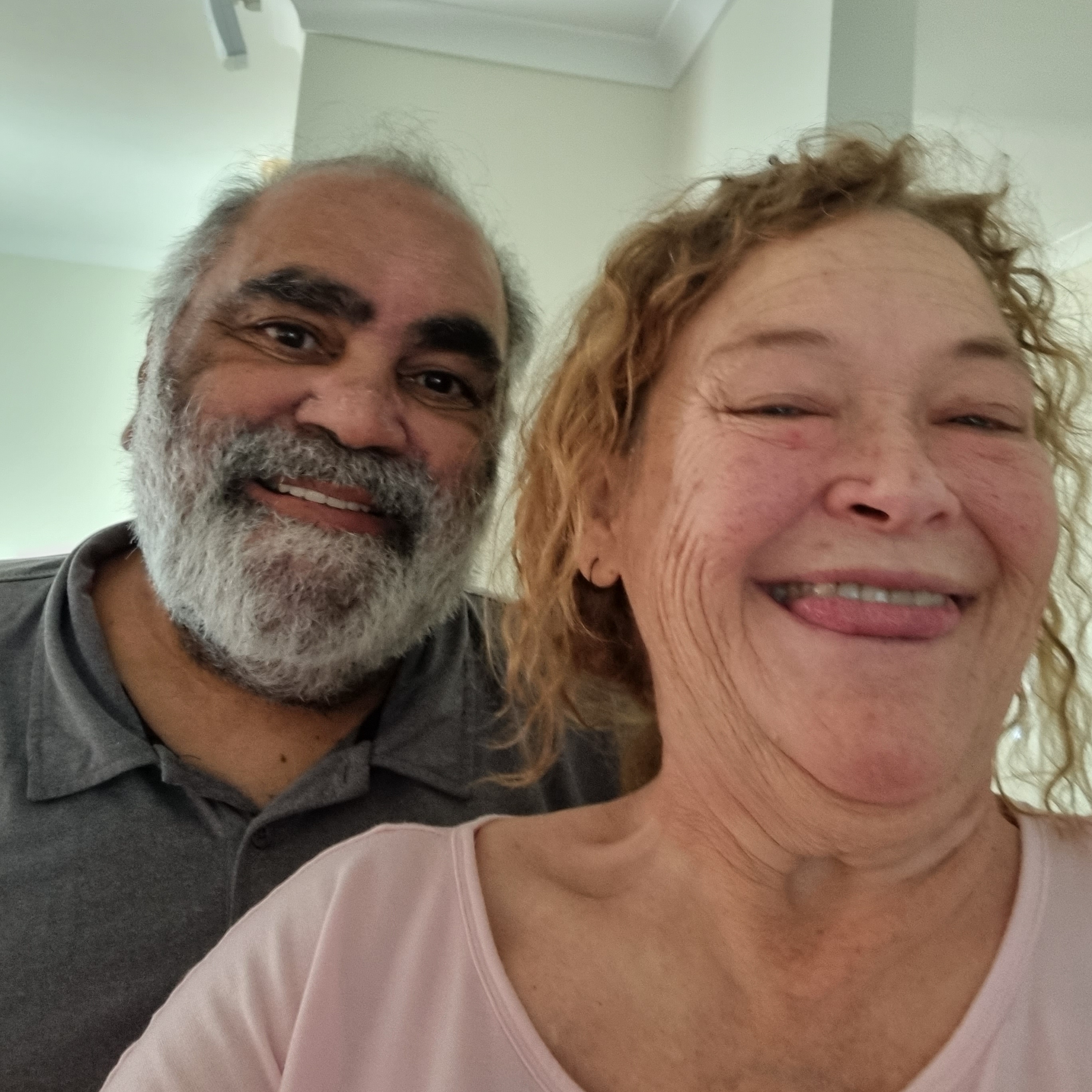 Martha, smiling next to her partner