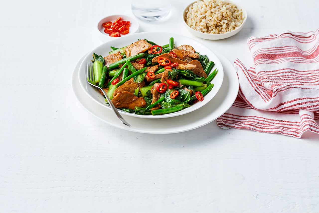 Plate of Chicken and Asian green stir-fry