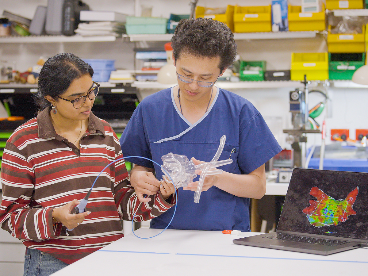 a man and a women working together in a lab 