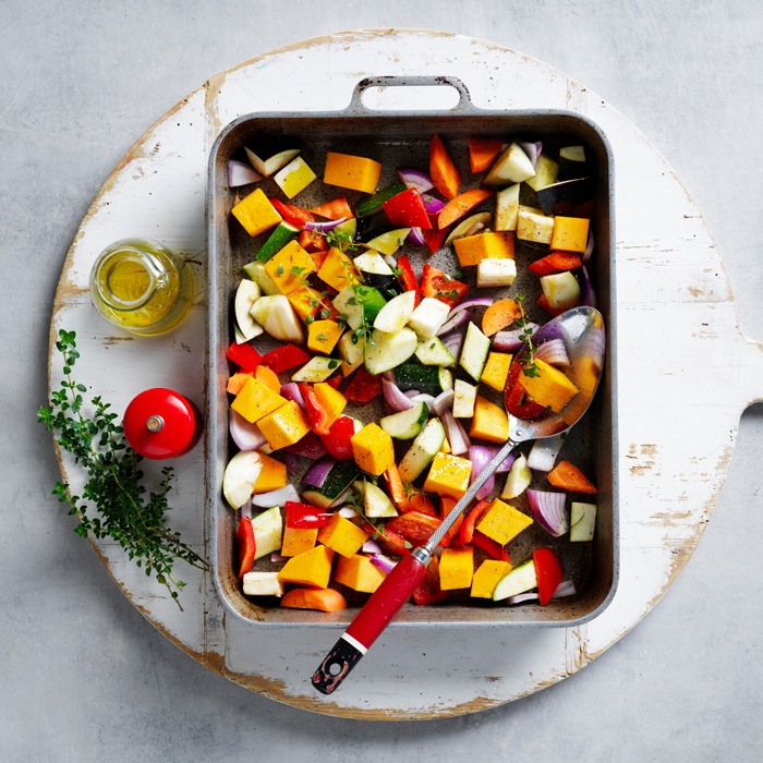 uncooked vegetables in a baking tray
