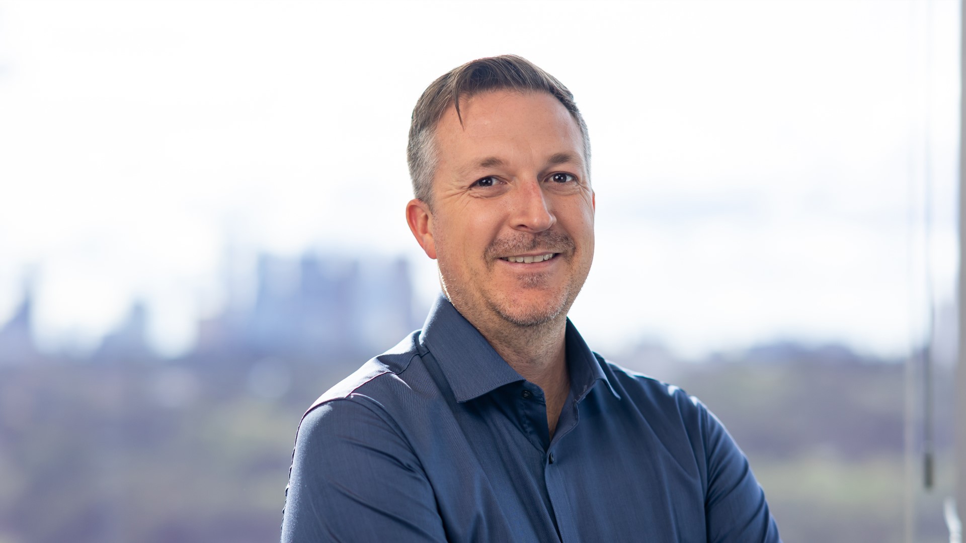 Professor Andrew Murphy posing in front of camera