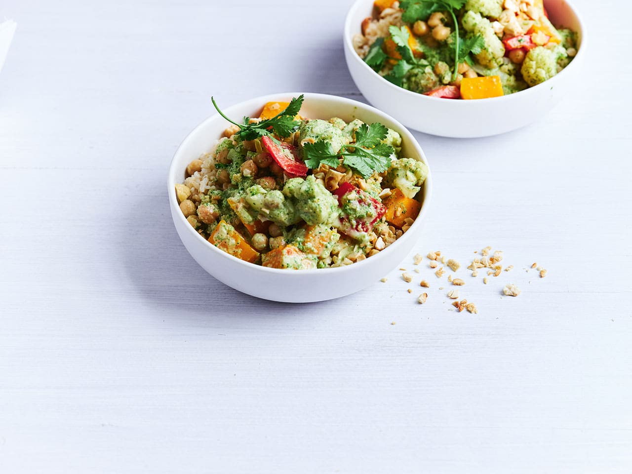 two bowls of Green vegetable curry