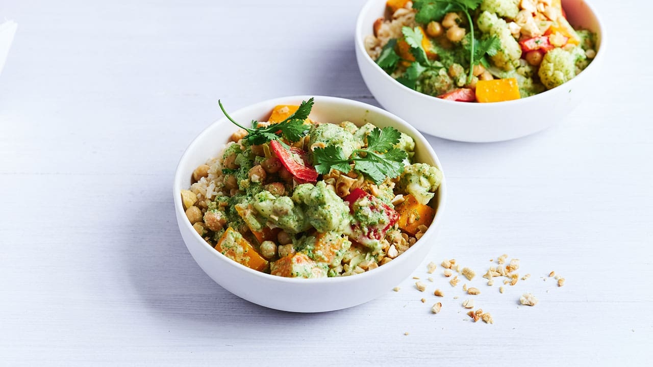 two bowls of Green vegetable curry