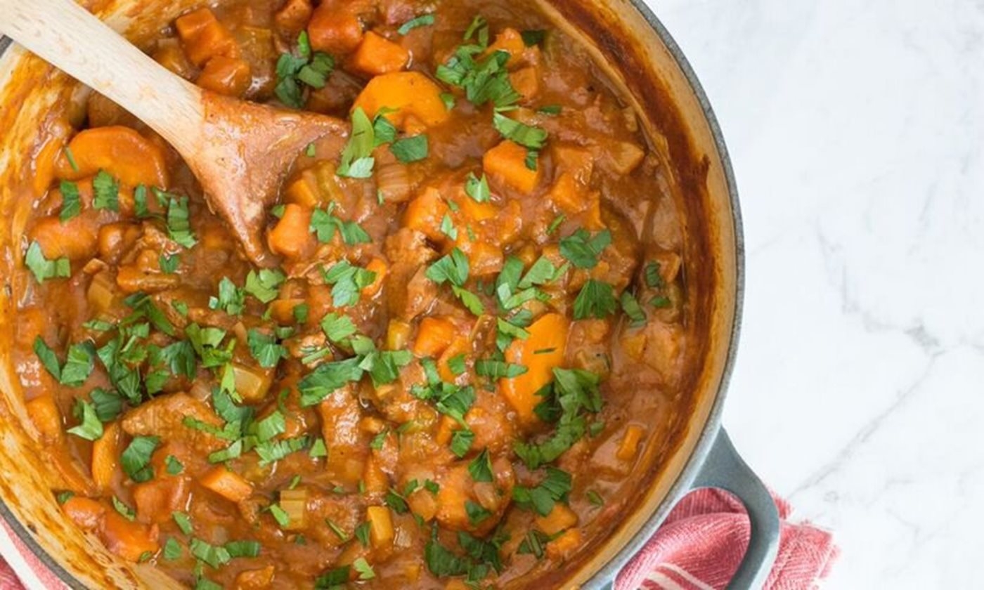 A hearty stew made with sweet potatoes, carrots, and parsley