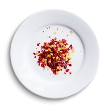 dry chilli flakes on white plate