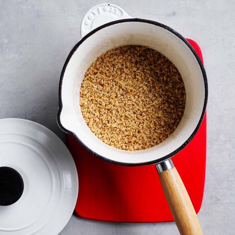Quinoa cooking in a saucepan