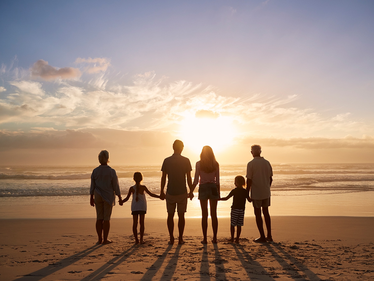 An intergenerational family at the beach