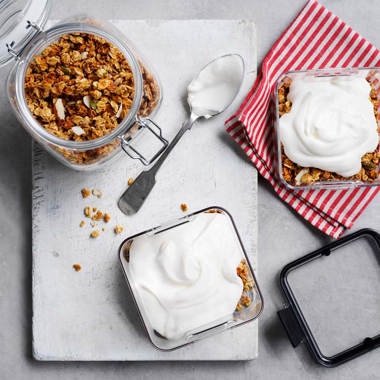 Yoghurt spooned over granola