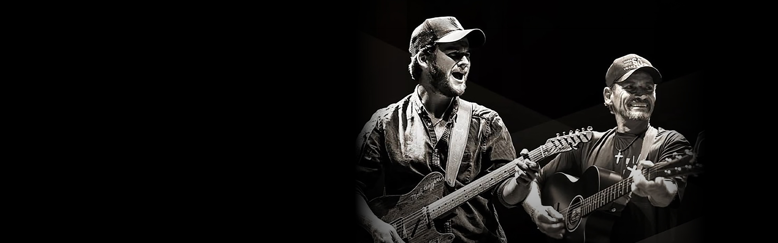 Image of Ben and Noel Haggard playing guitars