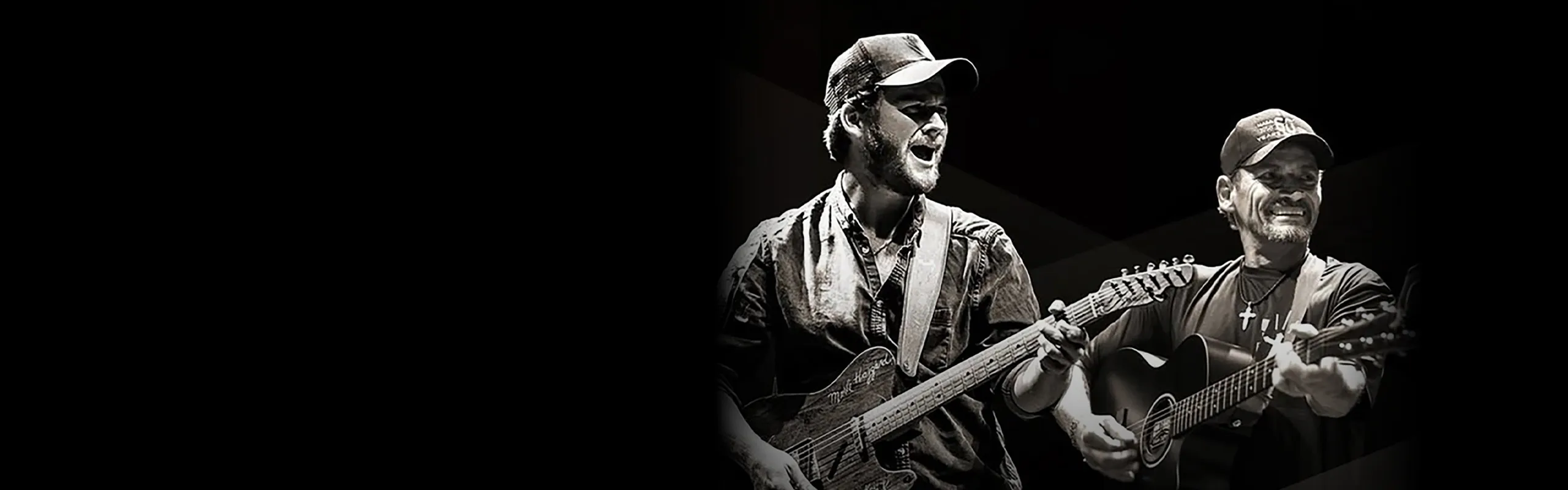 Image of Ben and Noel Haggard playing guitars