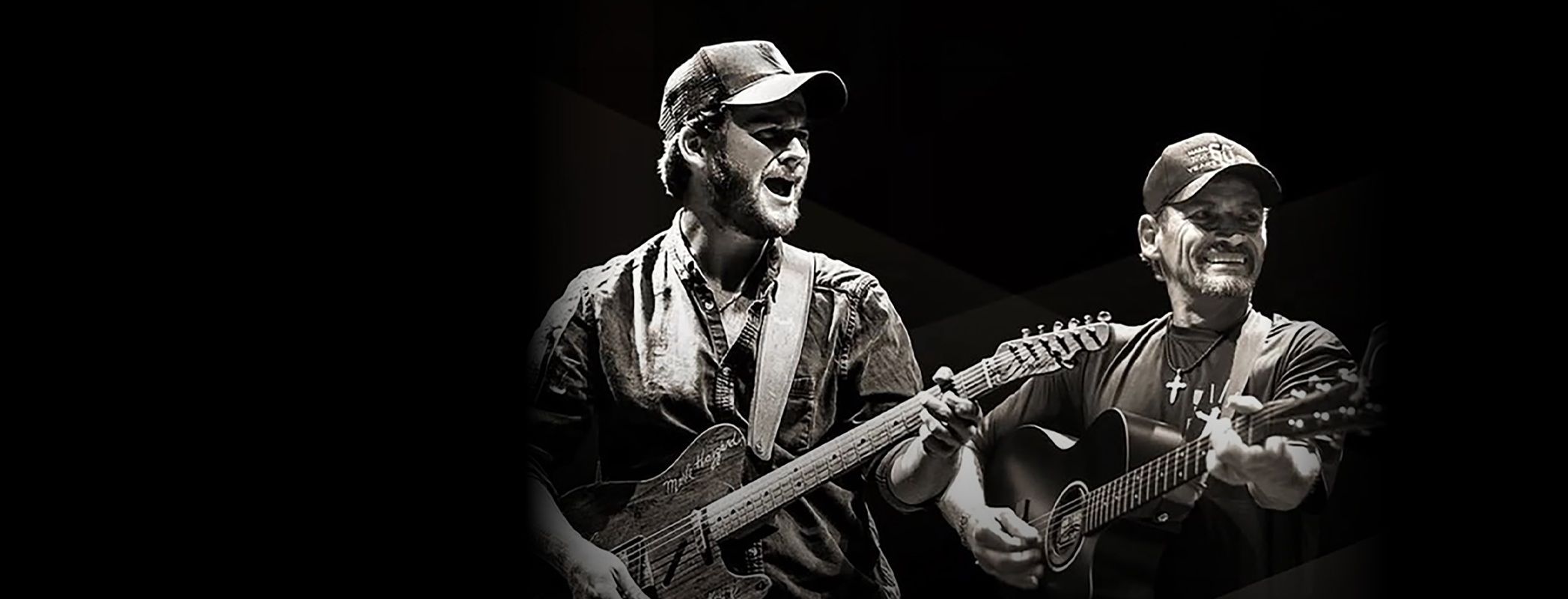 Image of Ben and Noel Haggard playing guitars