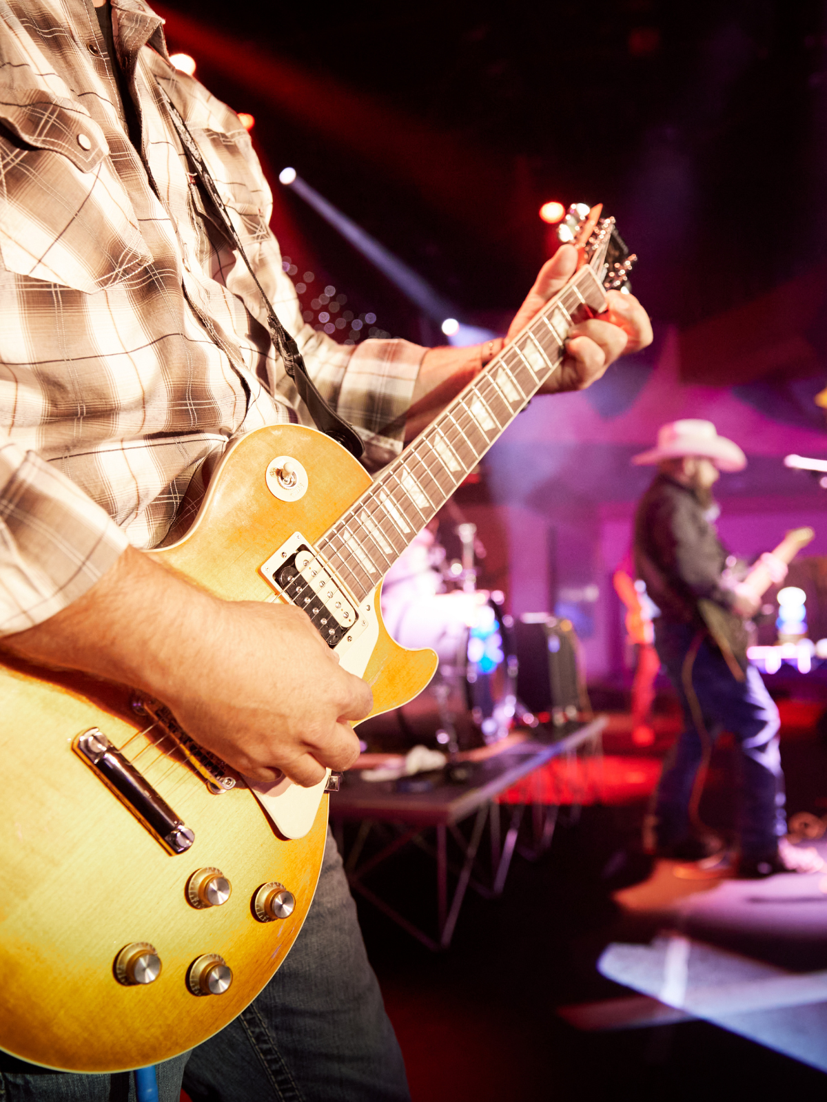 Band members playing guitars