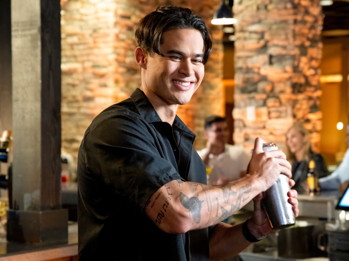 Bartender making craft cocktail