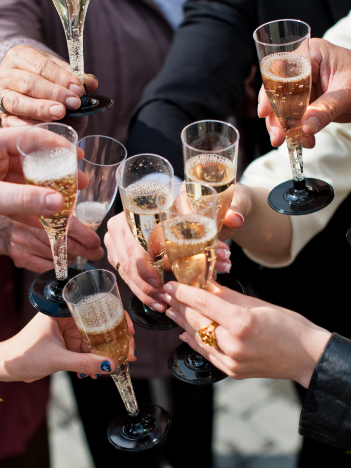 Group of people doing champagne toast