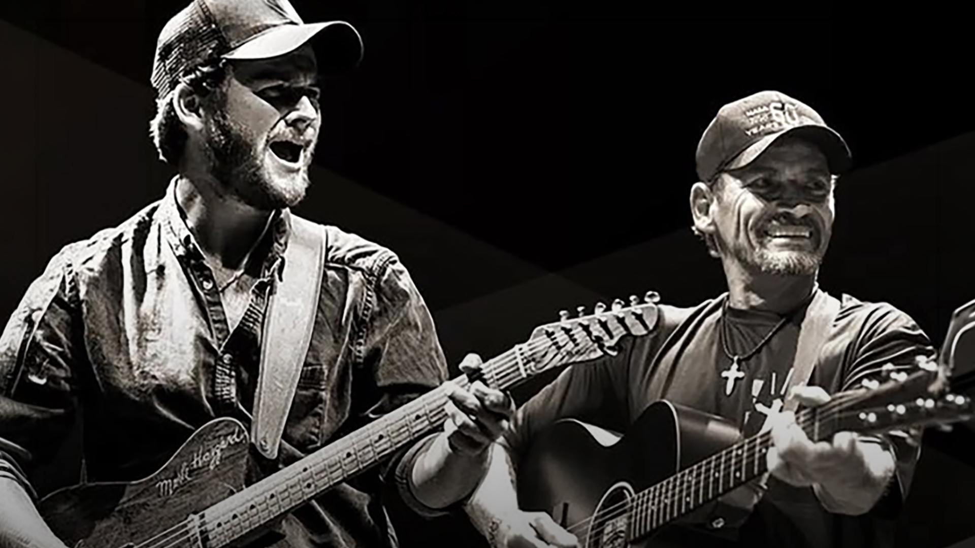 Image of Ben and Noel Haggard playing guitar