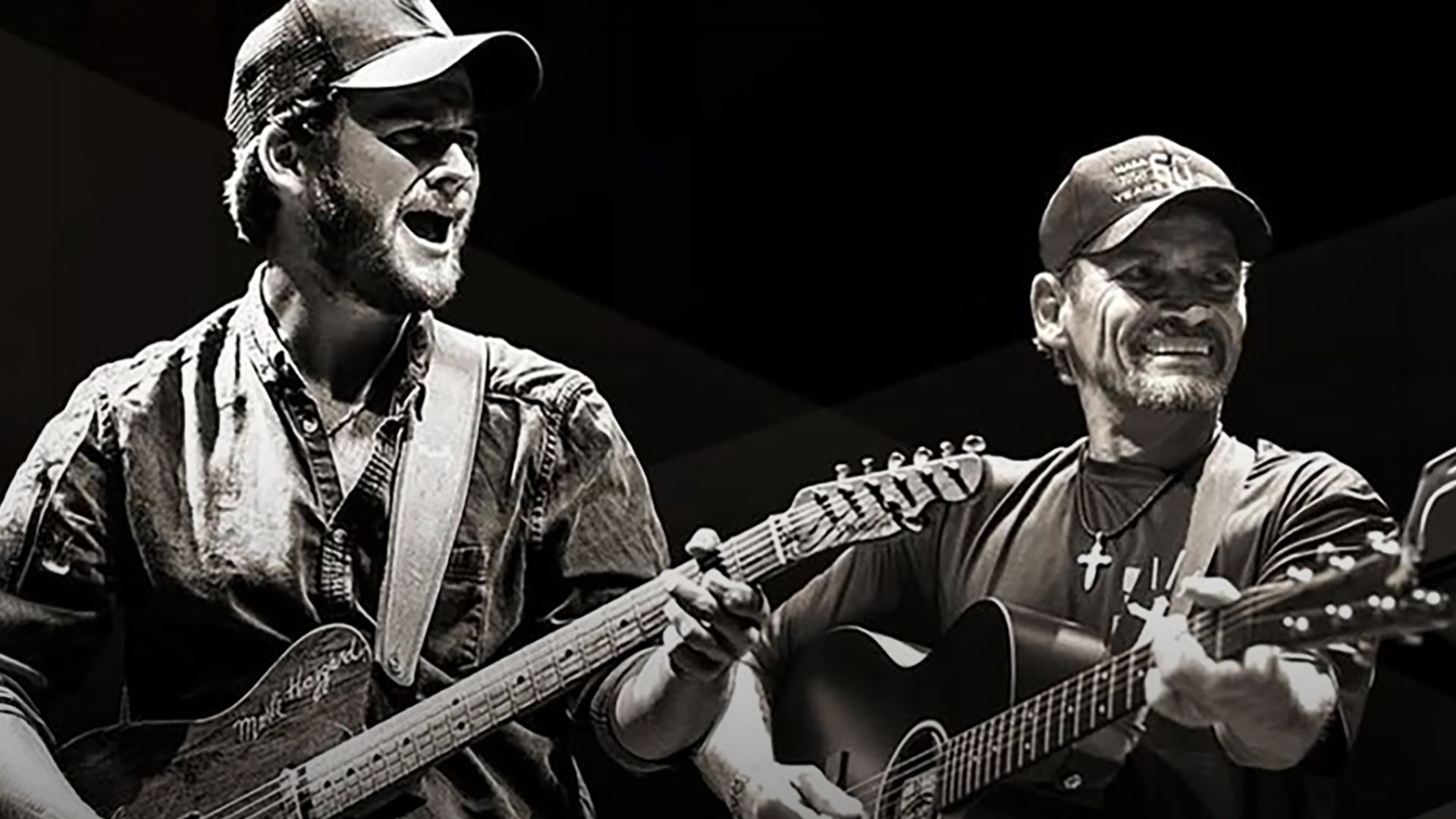 Image of Ben and Noel Haggard playing guitar