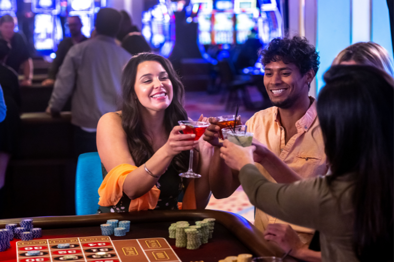 Women toasting at roulette table