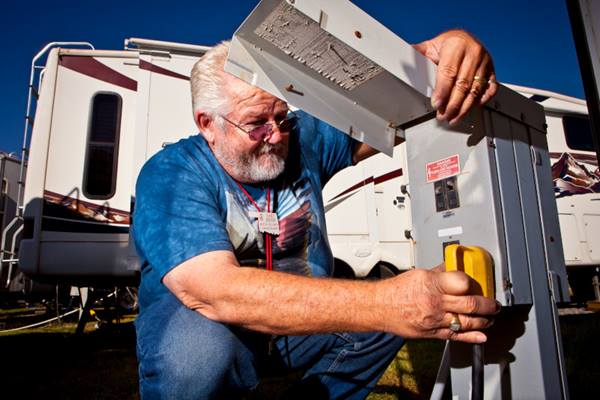 Man plugging in at campground