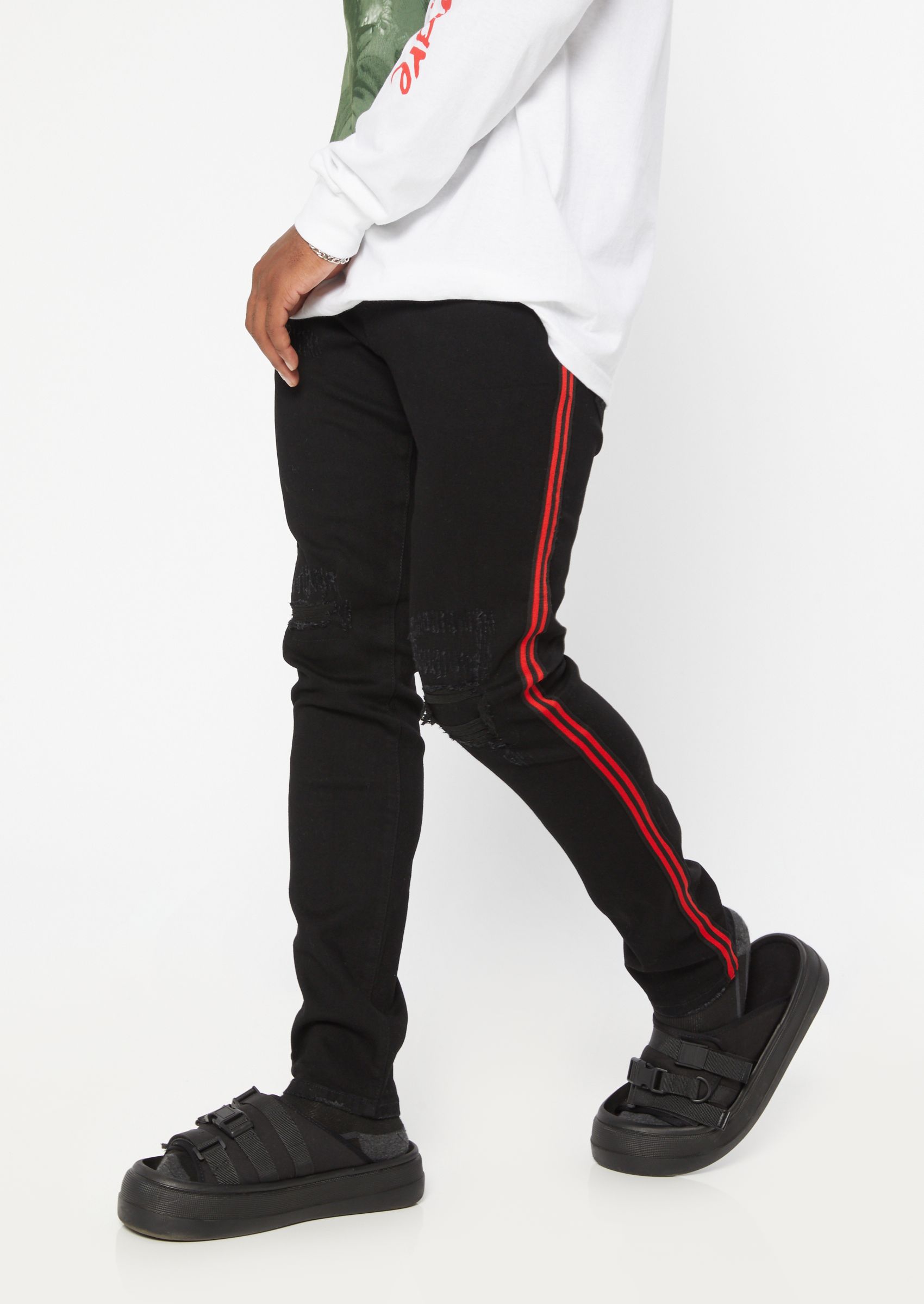 black jeans with red side stripe