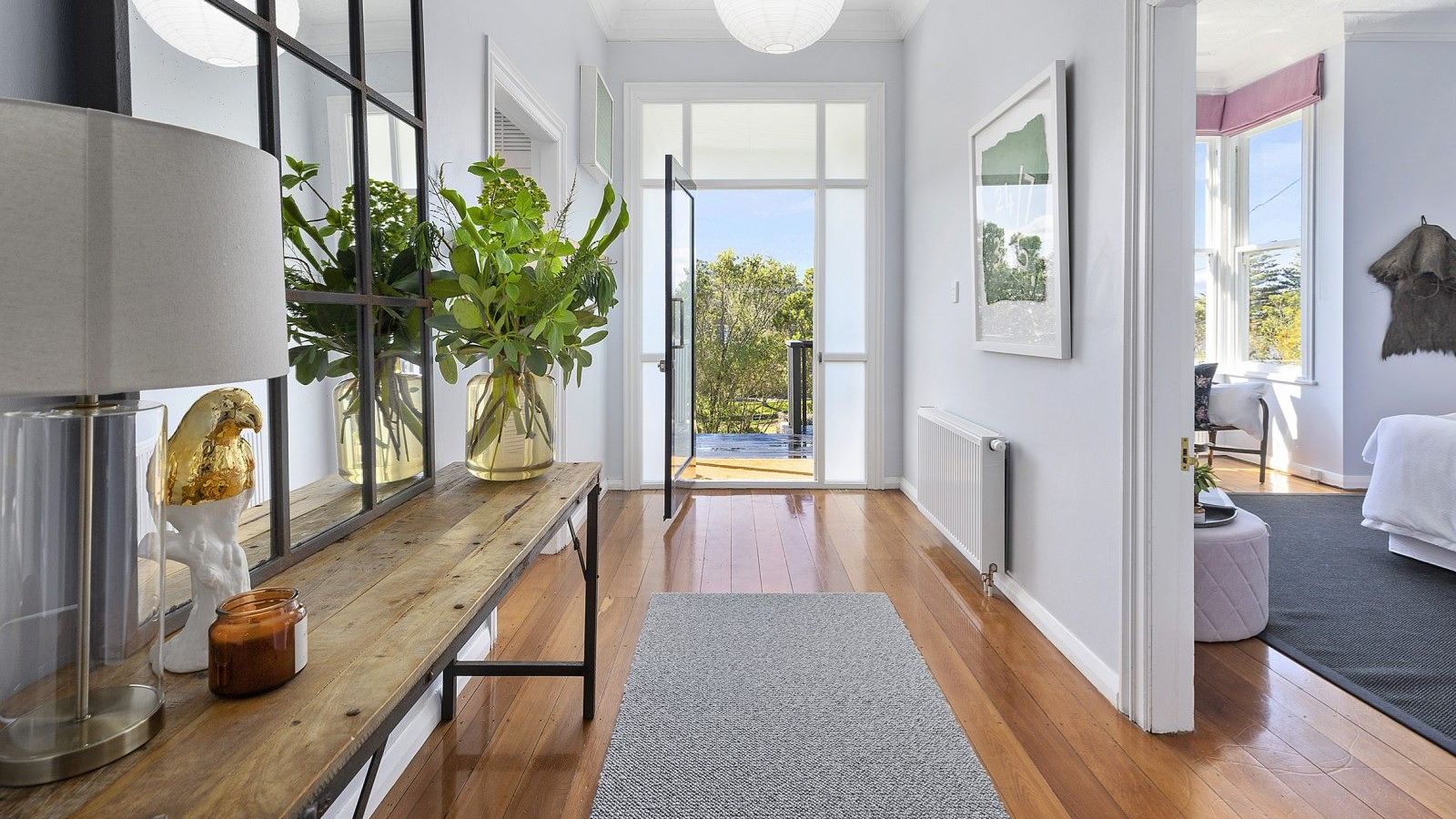 Hallway of a house facing out towards the front door