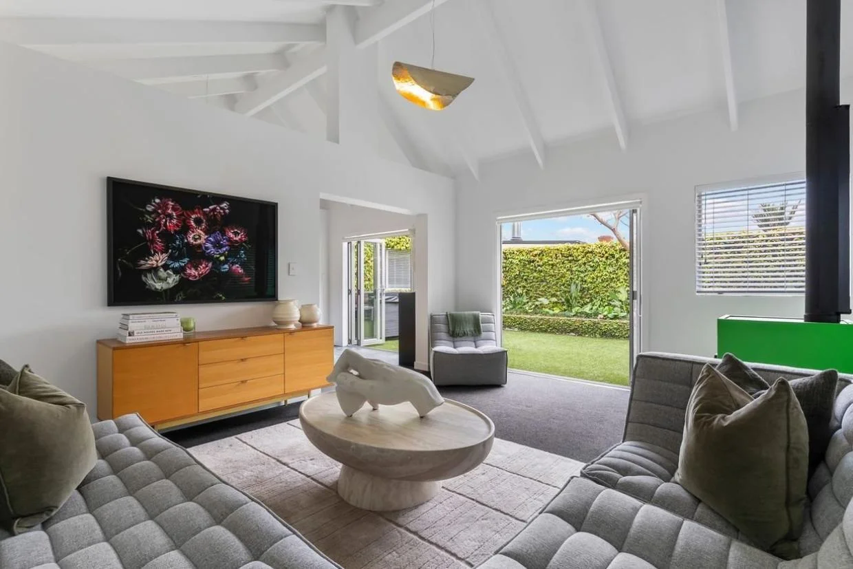 The living room is set at the rear of the house.