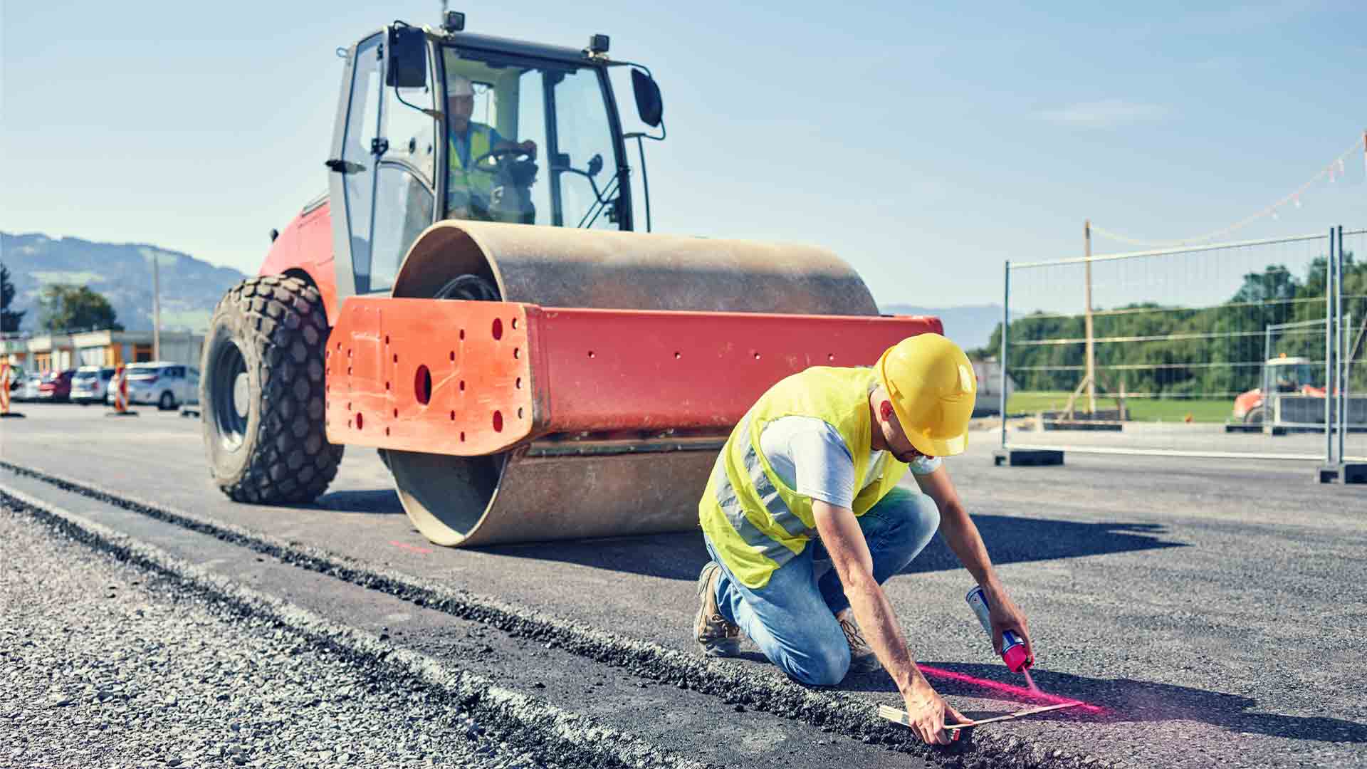 Team working together to repair a road in NZ.