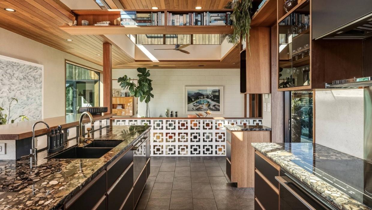 The bespoke chef’s kitchen is the heart of the home