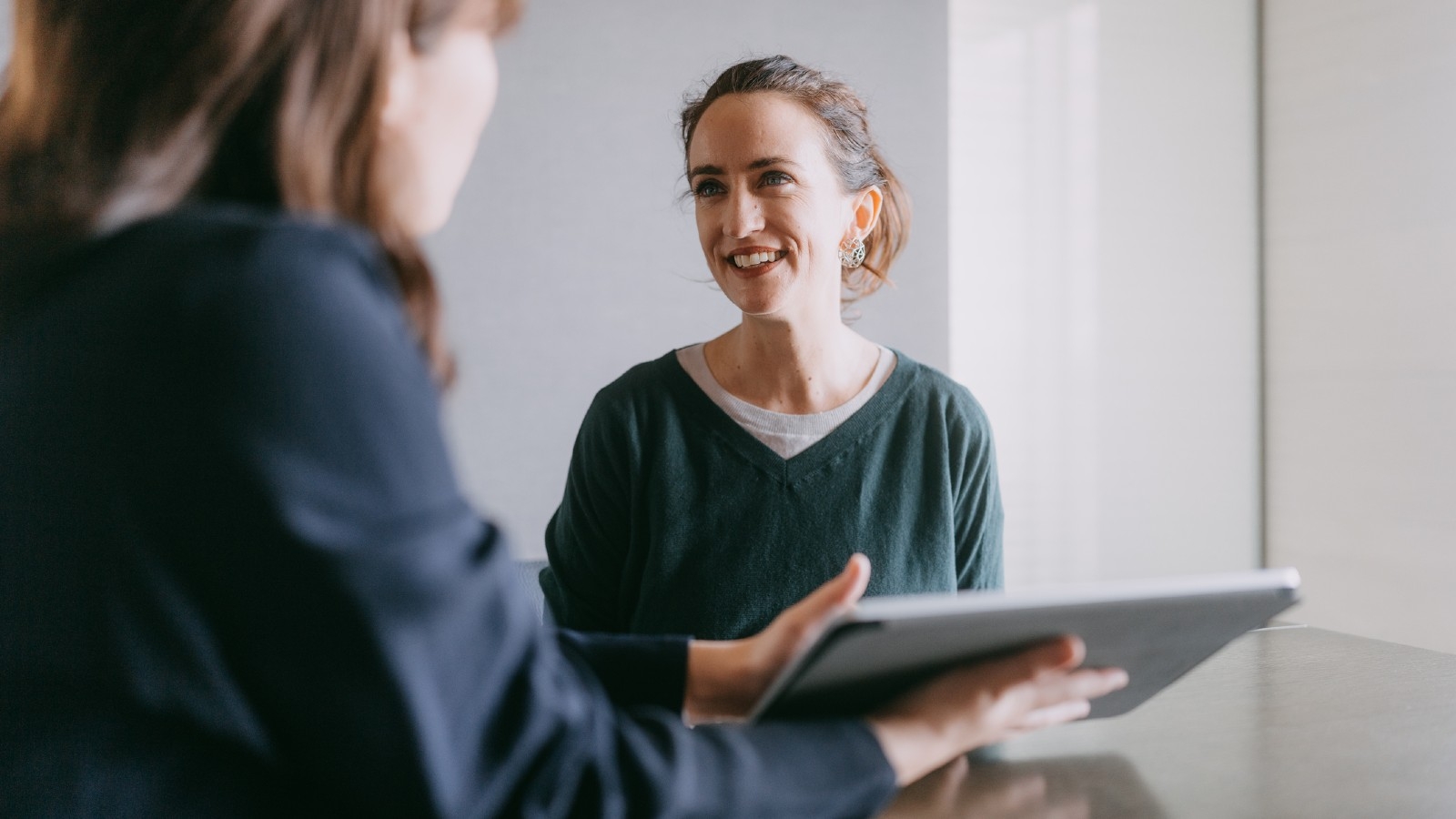 Woman getting mortgage advice. 