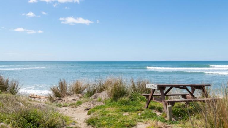 The beach is 50 metres away. Photo: Property Brokers/TRADE ME