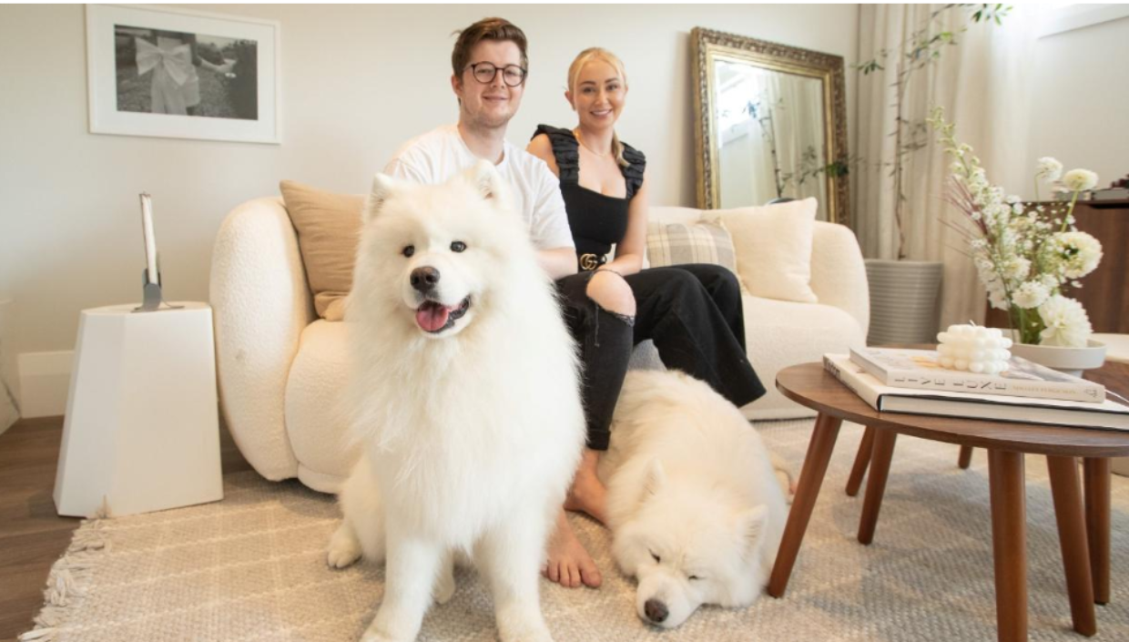 Stacy and Adam Middleton with their two dogs.