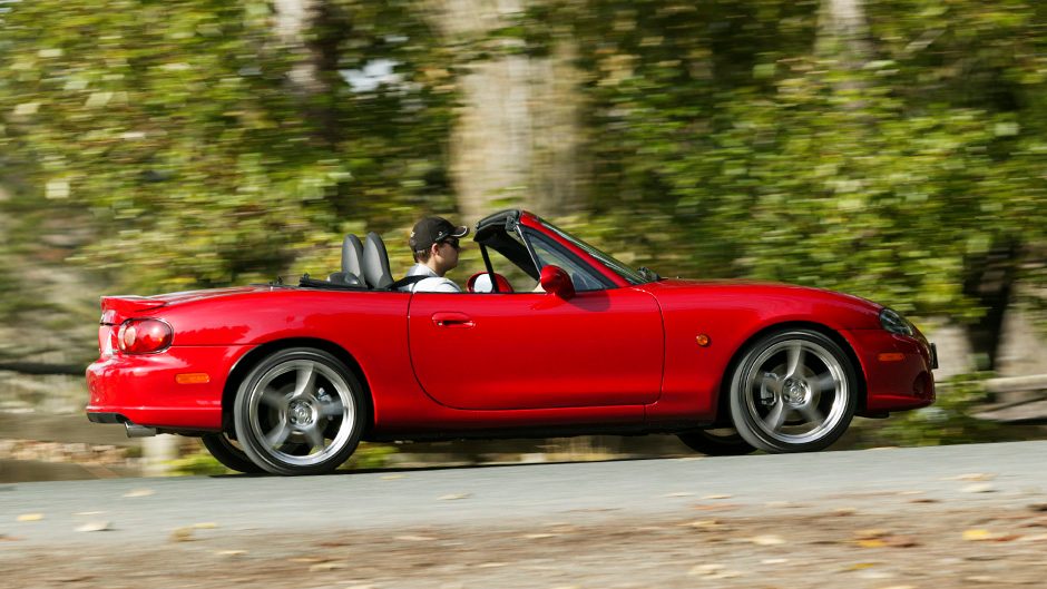 red Mazda MX-5 side action