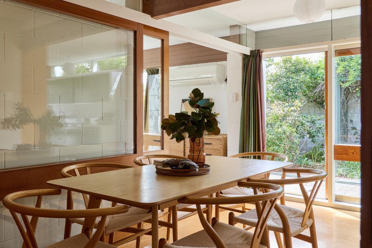 The sliding glass doors that partition the space, but allow maximum light through.
