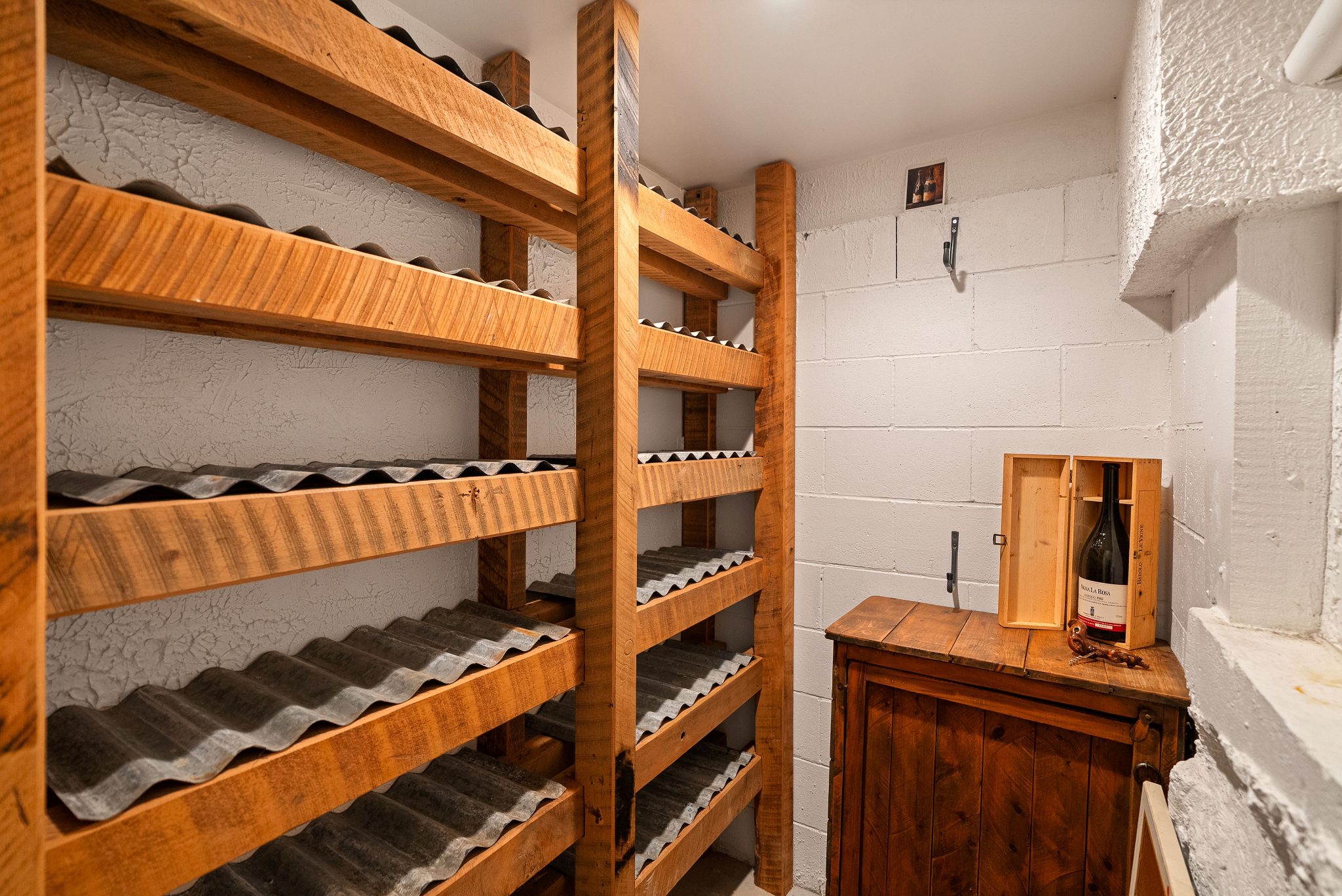 The hidden wine cellar.
