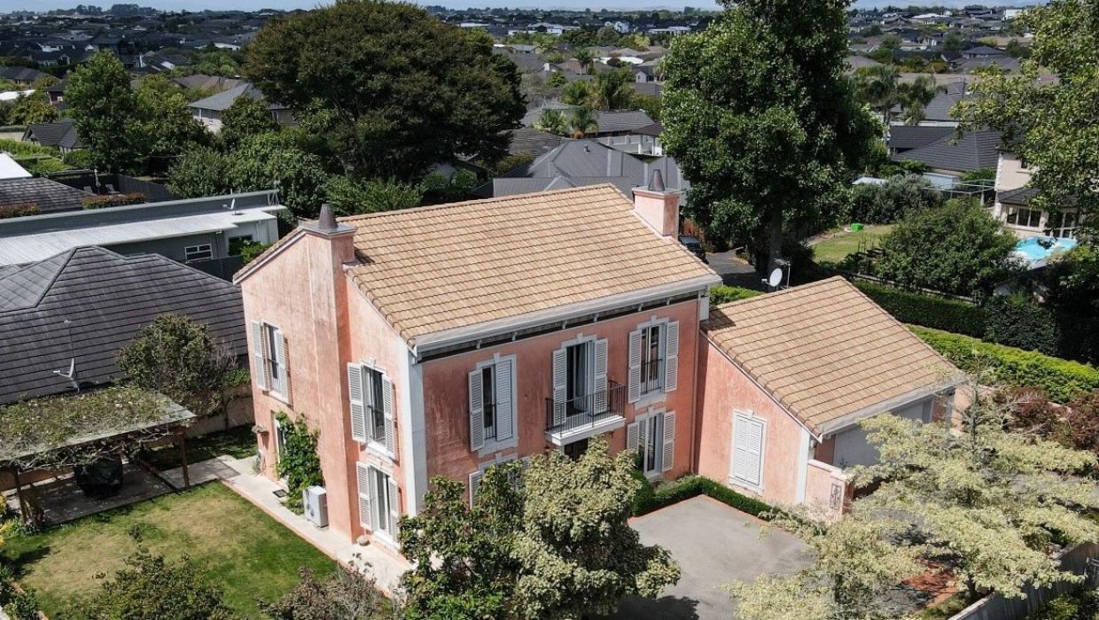 Exterior of Hamilton home, with limewash over the plaster ensuring a classic, aged appearance