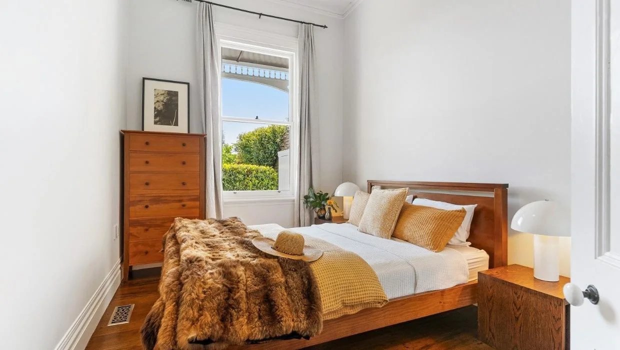 The home has three bedrooms. One is pictured