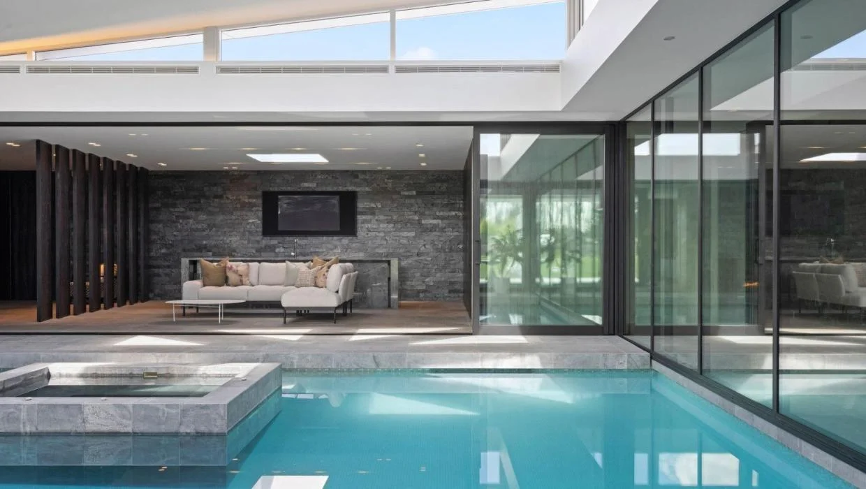 The pool is the heart of the home