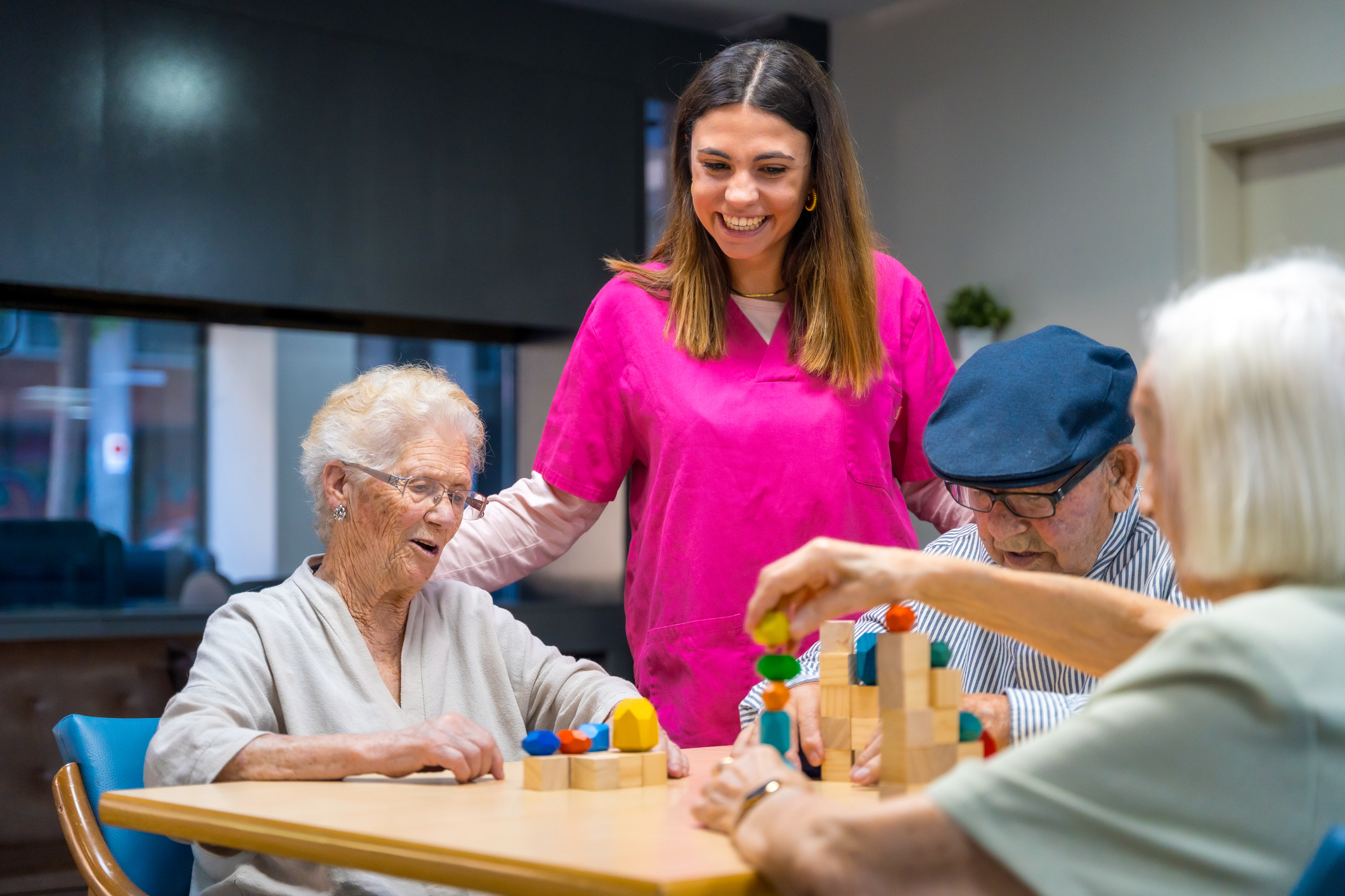 Aged care nurse engaging with residents