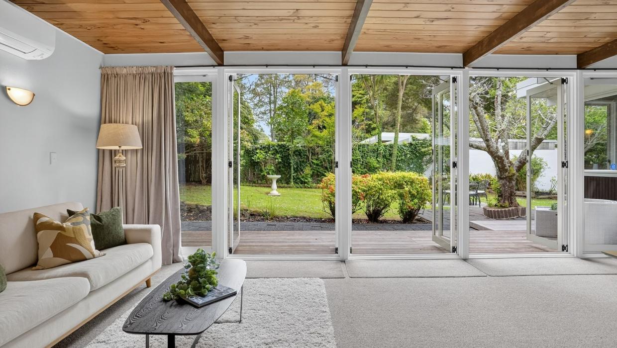The living room opens onto the garden. 