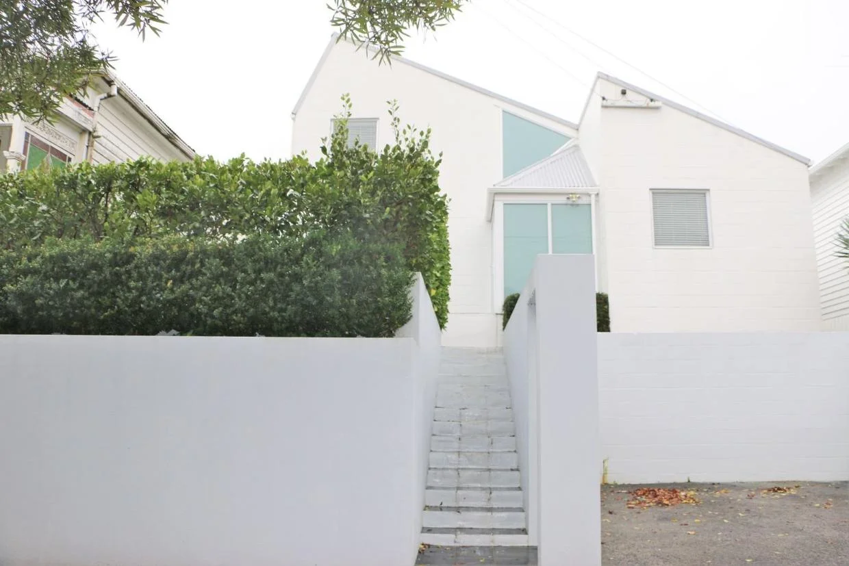 Eterior of home 10-years ago before the ivy grew in