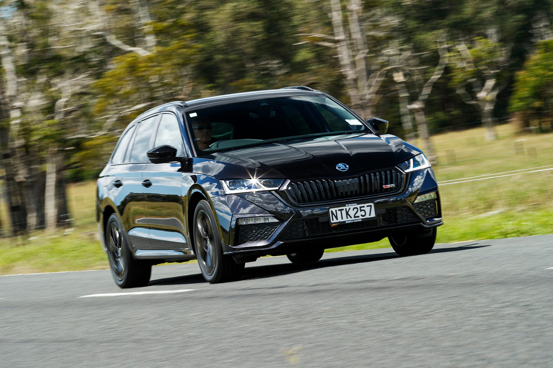 Black Skoda Octavia RS iV Action shot from the front.