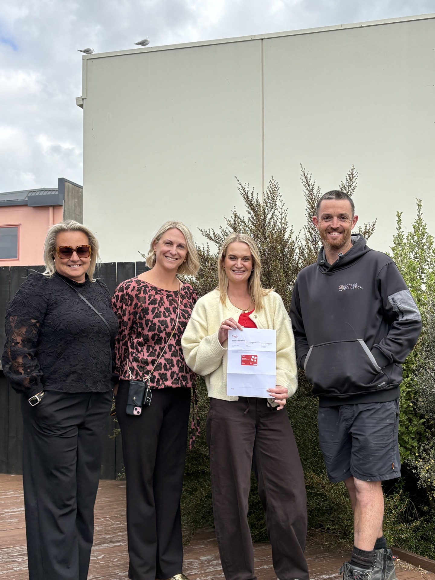 Kylie Pullen & Belinda Sammons with their happy homeowners