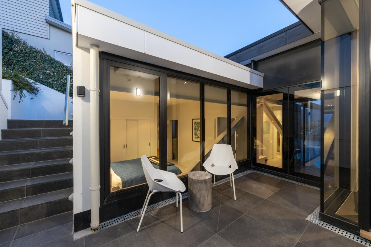 Second bedroom opens out to a private courtyard 