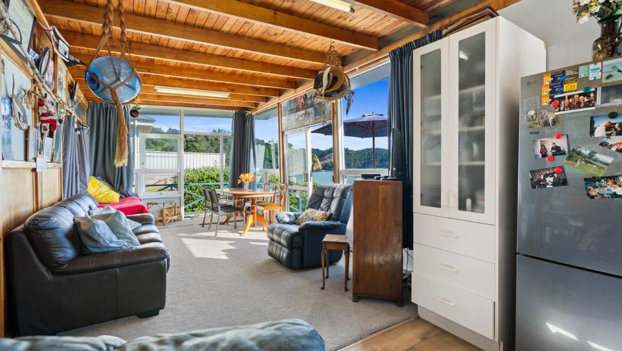 Timber sarking lines the ceiling. Photo: Bayleys
