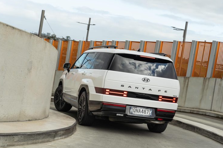 Hyundai Sante Fe driving rear view