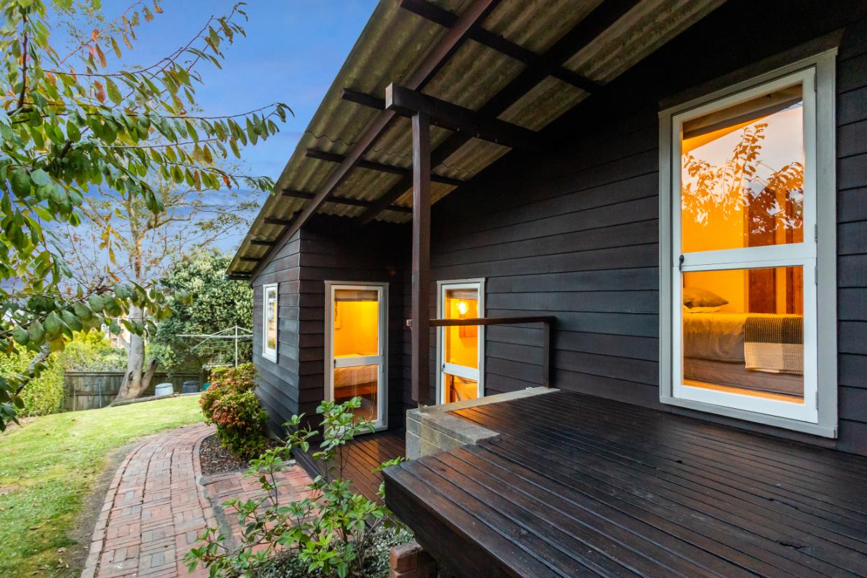 Multiple doors open onto the courtyard, creating seamless indoor-outdoor flow.