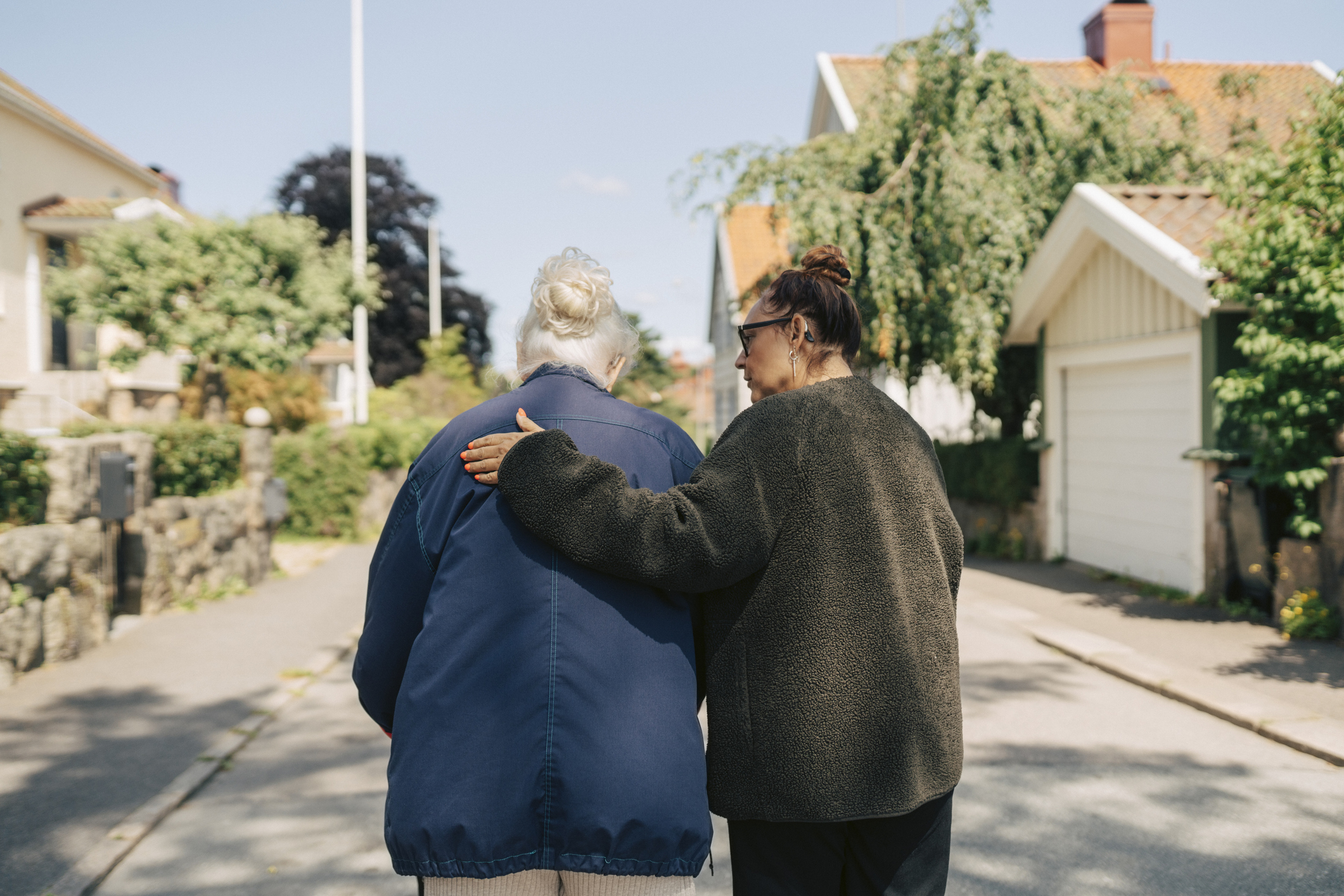 Female social worker comforting and supporting individual